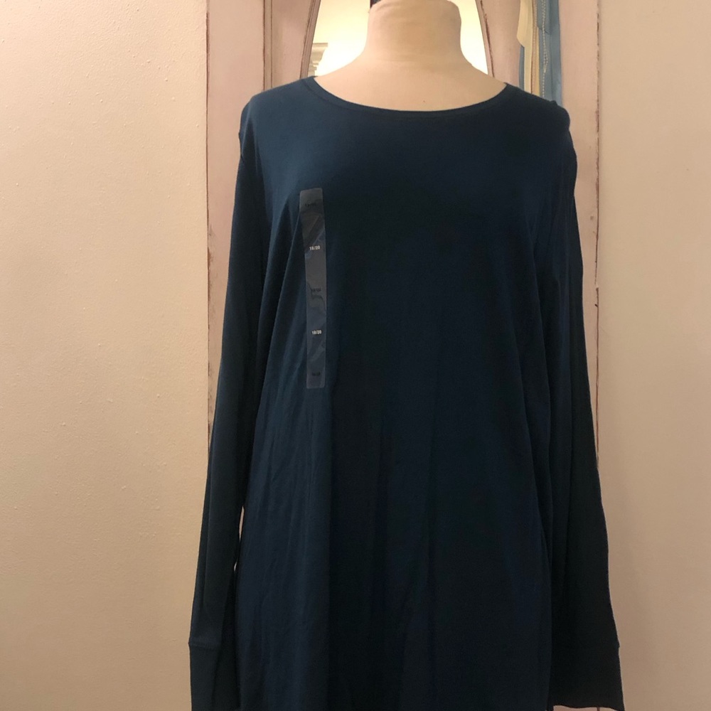 Never worn long sleeved tee size 18/20